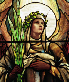 Stained glass angel representing Hope by Tiffany Studios