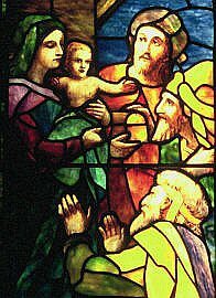 Detail from stained glass window by Tiffany Studios showing the Adoration of the Magi