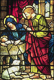 Detail from a stained glass window by Powell's showing the Nativity